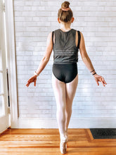 Load image into Gallery viewer, back side of ballerina on pointe wearing sleeveless grey dancing looks good on me tank with silver shimmer letters