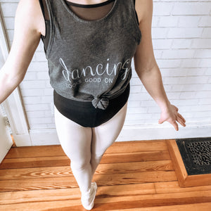 ballerina on pointe wearing sleeveless grey dancing looks good on me tank with silver shimmer letters