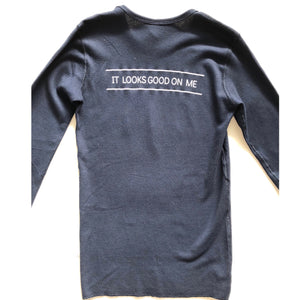back of a long sleeve navy blue Maine looks good on me thermal waffle shirt with white letters