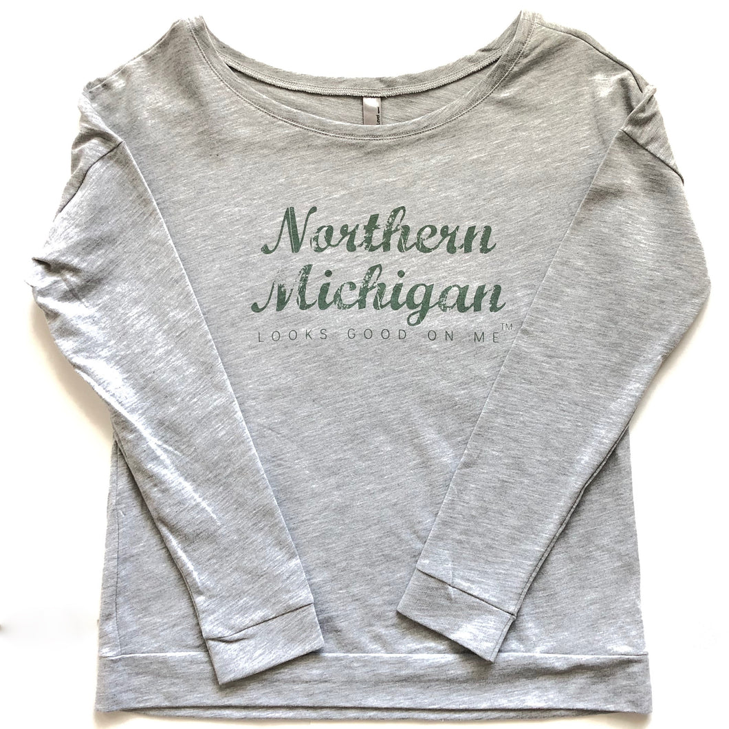 front of grey long sleeve Northern Michigan looks good on me shirt with forest green letters