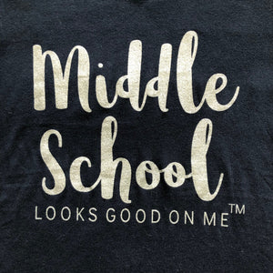 close up of silver sparkle letters on middle school looks good on me t-shirt