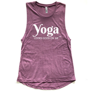 front of purple sleeveless yoga looks good on me tank top with white letters